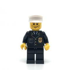 LEGO cty0095 - Police (City Suit with Blue Tie and Badge, Black Legs, Vertical Cheek Lines, Brown Eyebrows, White Hat)