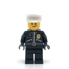 LEGO cty0256 - Police (City Leather Jacket with Gold Badge and 'POLICE' on Back, White Hat, Lopsided Smile)